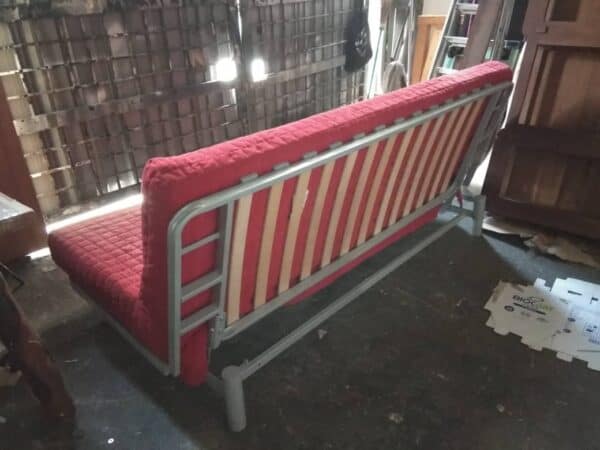 IKEA NYHAMN THREE SEATER SOFA BED WITH RED COVER